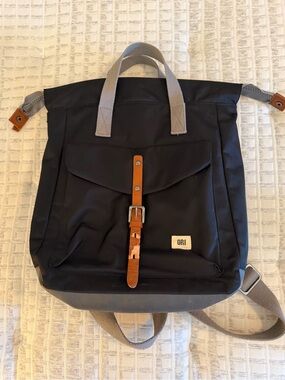 Black Backpack with Brown Leather Strap